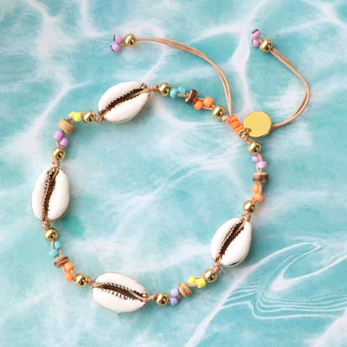 Lassen Sie sich zu sommerlichem Schmuck mit Kaurimuscheln inspirieren